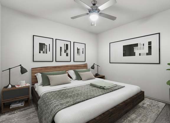 A bedroom with a bed, nightstands, and a ceiling fan.