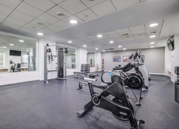 the gym at the district flats apartments in lenexa