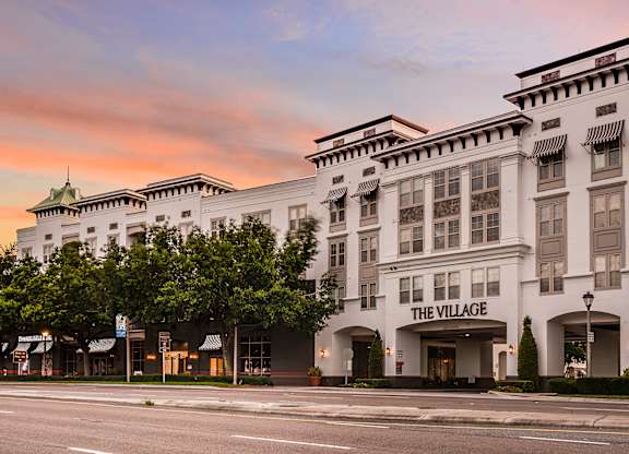 The front of a hotel called The Village.