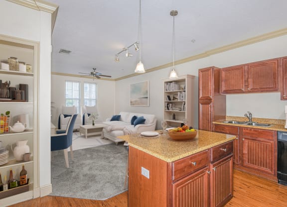 a kitchen with wooden cabinets and a counter top