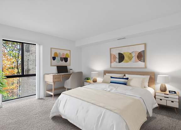 A bedroom with a large bed, a desk with a chair, and a painting on the wall.
