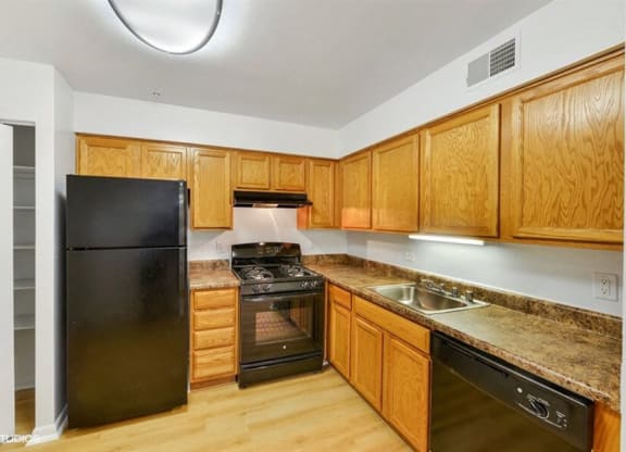 Fully Equipped Kitchen with Large Pantry At The Forest Apartments in Rockville, MD