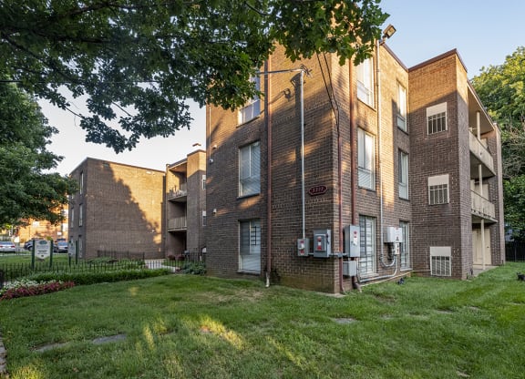 our apartments are located in a quiet neighborhood with a green lawn