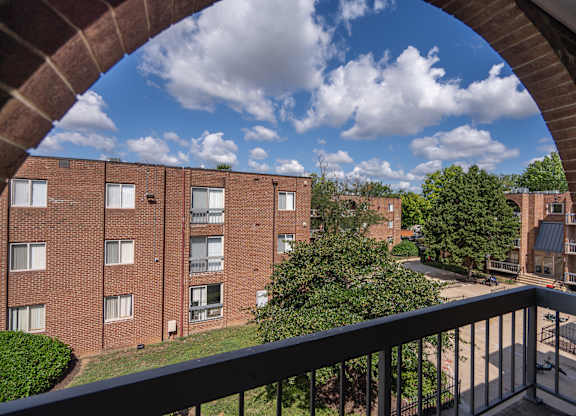 A view of a residential area from a balcony.