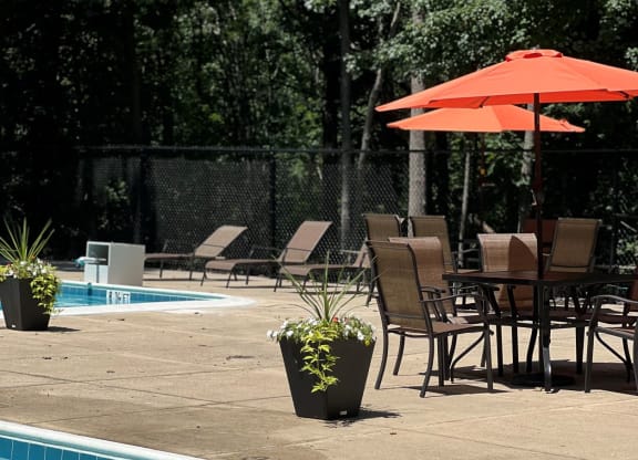 Poolside Dining Table at The Forest Apartments, Rockville, Maryland