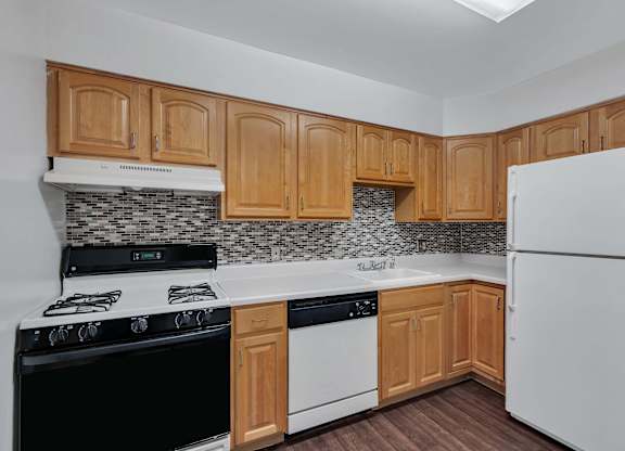 Kitchen with wooden closet at Aspen at Lake Trail, Columbia, MD