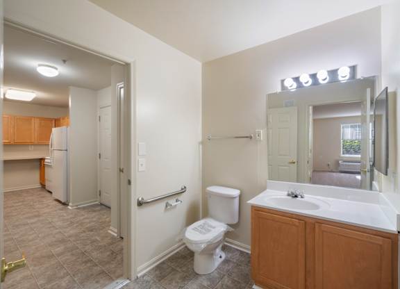 Well-lit bathroom at River Point Apartments, Essex, MD