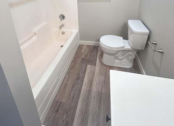 Spacious Bathroom with tub shower at Briarcliff at Quechee Apartments, Quechee, VT 05059