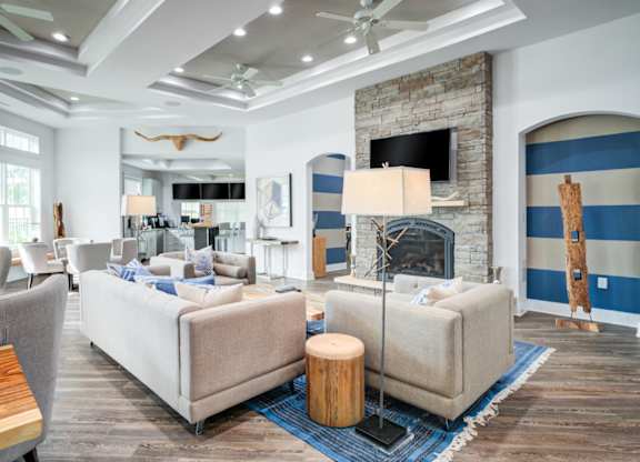 a living room filled with furniture and a fire place  at Century Avenues, Florida