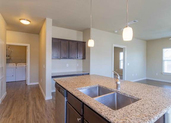 a kitchen with a large counter top and a sink at Century Palm Bluff, Portland, TX, 78374