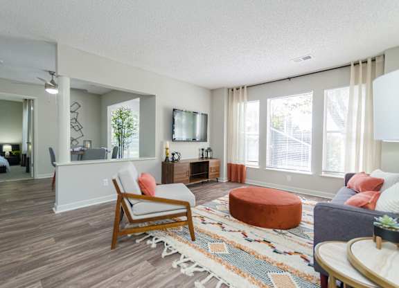 Living Area With Kitchen at The Carter 4250 Apartments, Norcross, Georgia