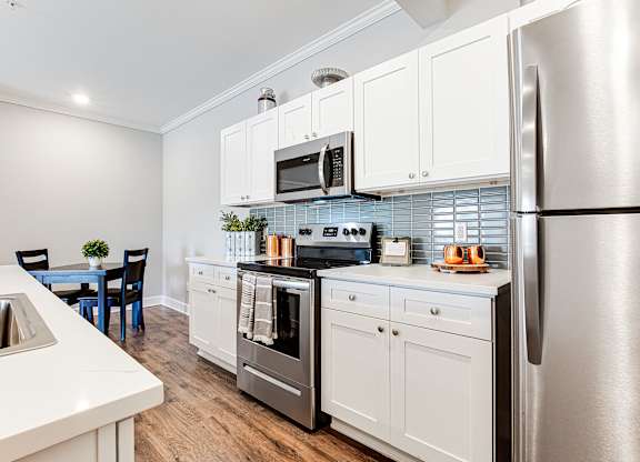 Fully Equipped Kitchen With Modern Appliances at Liberty Club, Hinesville, GA