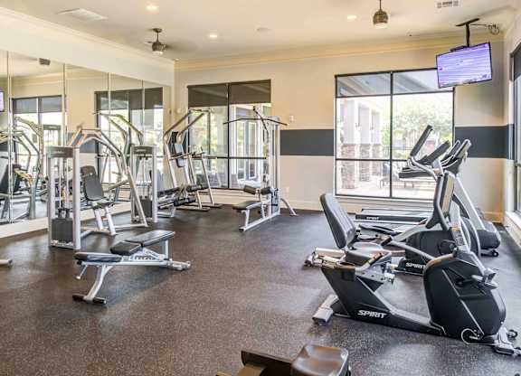 the gym is equipped with state of the art cardio equipment and weights at Century HomePlace, Prattville