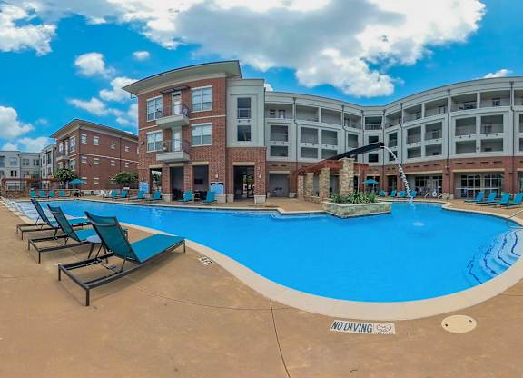 Pool With Relaxing Chairs at Century Cedar Hill, Cedar Hill