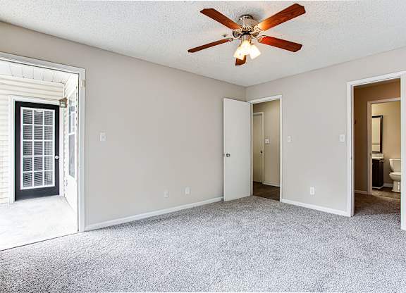 Lush Wall-To-Wall Carpeting In Bedrooms at Wildcreek Apartments, Georgia 30021