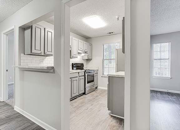Kitchen And Hallway at Wildcreek Apartments, Clarkston, GA