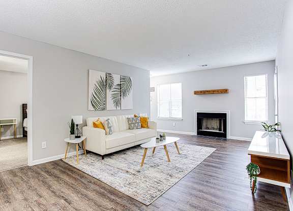 Living Area With Fireplace at Wildcreek Apartments, Clarkston