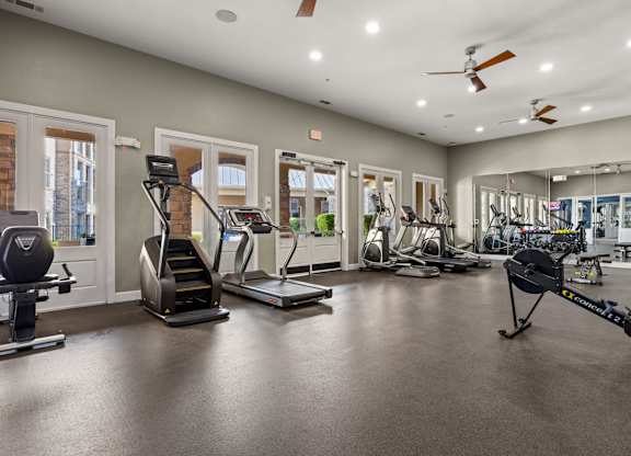 A spacious gym with a variety of exercise equipment. at The James on South First, Austin, Texas