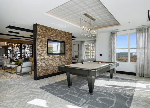 a billiards table in a lobby of a building