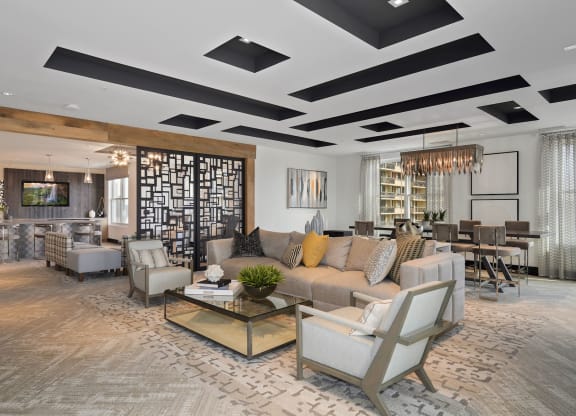a living room with a couch and a table