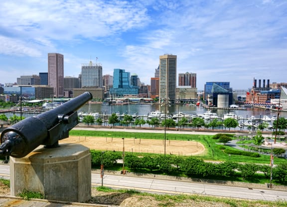 a cannon overlooking the baltimore inner harbor