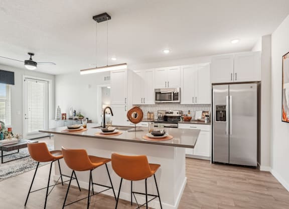 Furnished kitchen in one bedroom apartment model