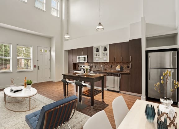 Image showing soaring ceilings, grounded comfort. A light-filled kitchen and living area that exudes effortless sophistication.