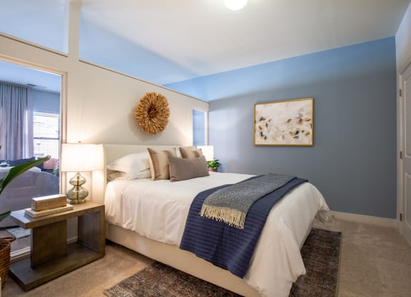 Image showing retreat, reset, relax. A plush bedroom oasis designed with soft lighting and natural textures.