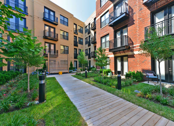 Image showing your daily reset. Manicured greenways and inviting paths just steps from your door.