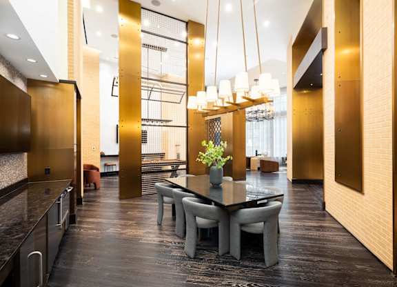 Image showing sophisticated first impressions. Soaring ceilings and architectural lighting set a grand tone.