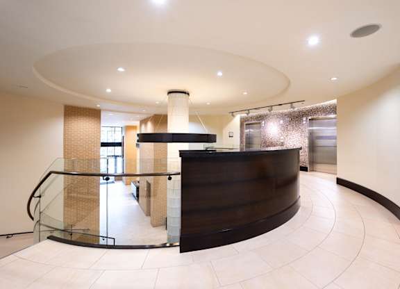 Image showing sculptural elegance. Circular forms and soft textures create a modern masterpiece of an entryway.