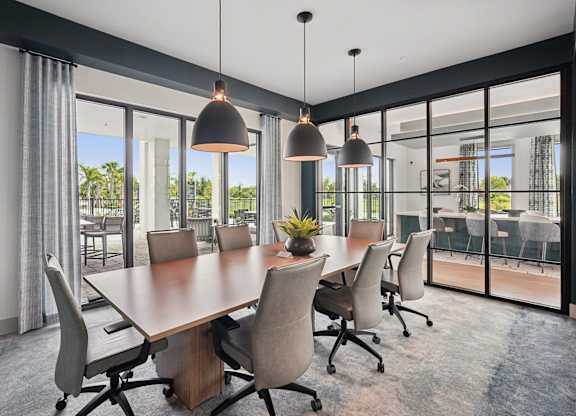 Resident conference room with large table and seating