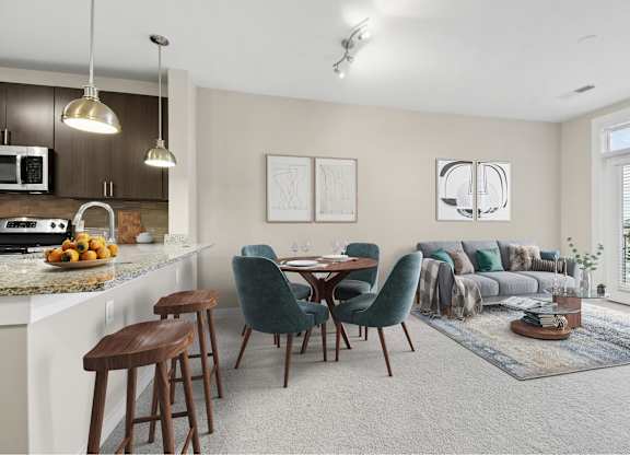 A modern kitchen with a dining area and a living room.