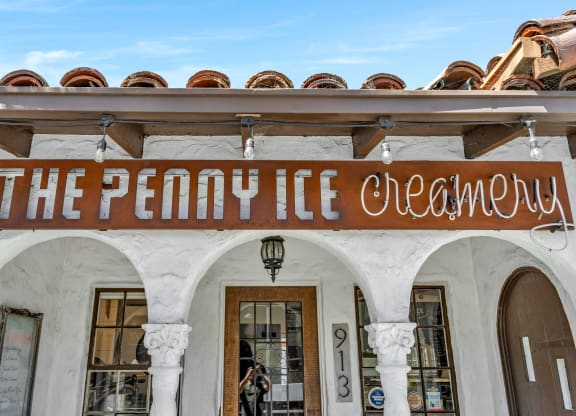 the penny ice cream building with a sign on the front of it