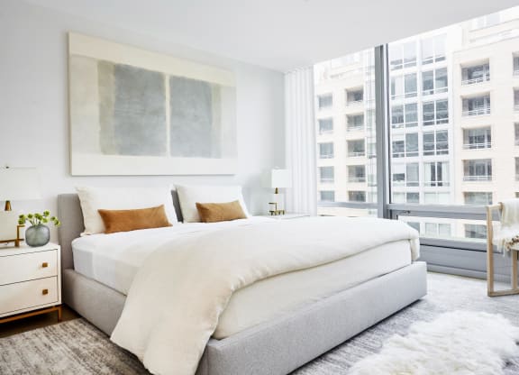 Apartment bedroom with expansive windows