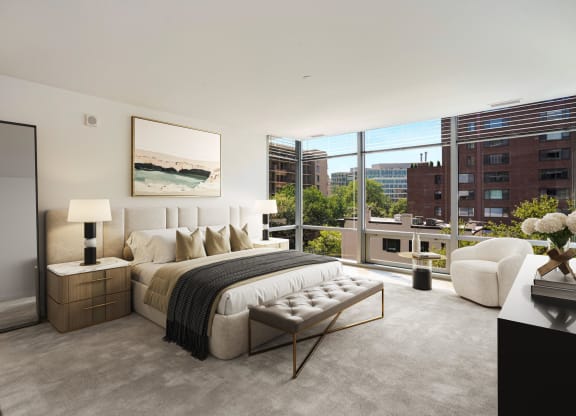 Large apartment bedroom with floor-to-ceiling windows