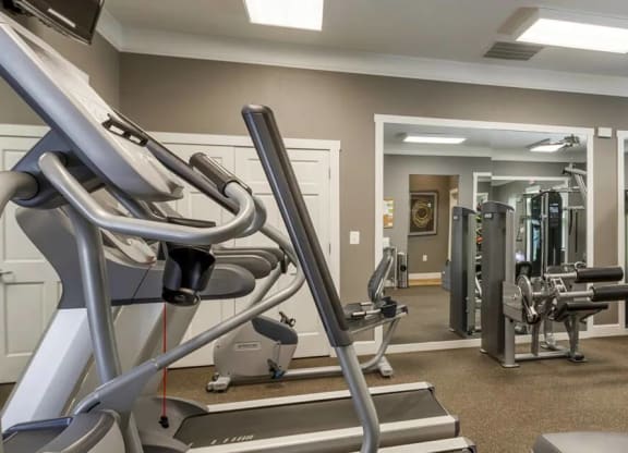 Fitness Center with cardio equipment and a mirrored wall at Chesapeake Ridge, North East, MD