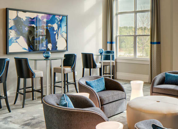 Resident lounge with seating and tables