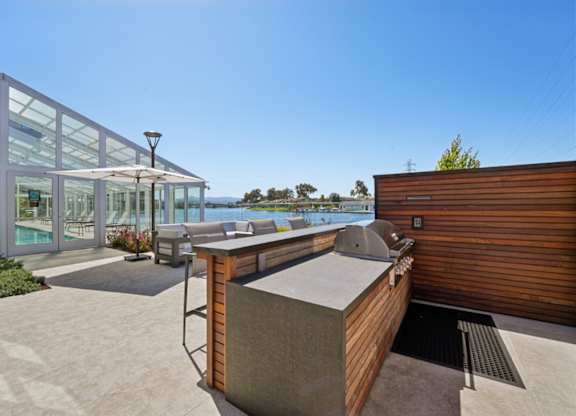 exterior grill area overlooking water