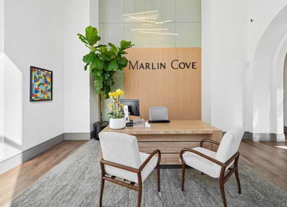 Leasing office at Marlin Cove Apartments with modern furnishings.