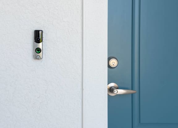 a door with a security camera on it