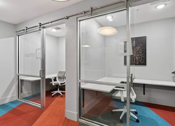 Resident coworking space with desks.