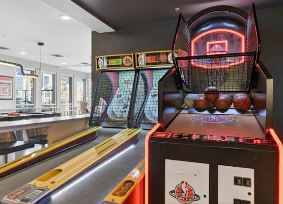 Indoor game room with tables and recreational space.