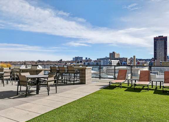 Courtyard with grills overlooking the Denver skyline.
