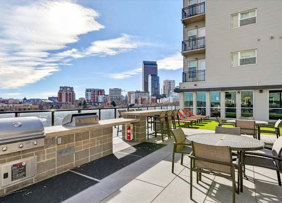 Courtyard with grills overlooking the Denver skyline.