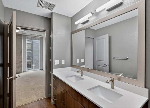 Modern bathroom with sleek finishes, neutral tones, and a bright, open layout.