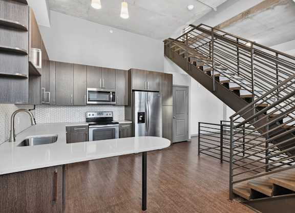Luxury kitchen interior with modern finishes and built-in appliances.