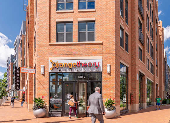 A red brick building with a sign that says