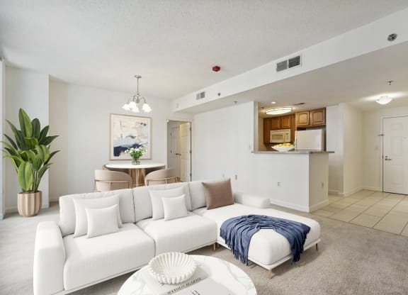 a living room with a couch and a table