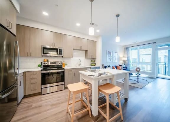 a kitchen with a island and a table